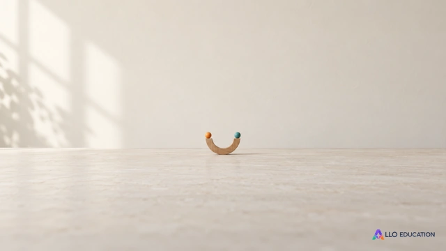 Une petite piste en bois en forme de U et deux billes sur ses branches évoquent une lecture de variation.